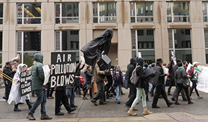 Students at the University of Pittsburgh hold a rally and march with the ghost of climate future. Students at the University of Pittsburgh hold a rally and march with the ghost of climate future.