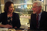 Award winners Sandra Graham-Bermann, PhD and Donald J. Hernandez, PhD talking over dinner.