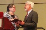 Donald J. Hernandez, PhD receives his award from Div. 37 president Mary Ann McCabe, PhD, ABPP 