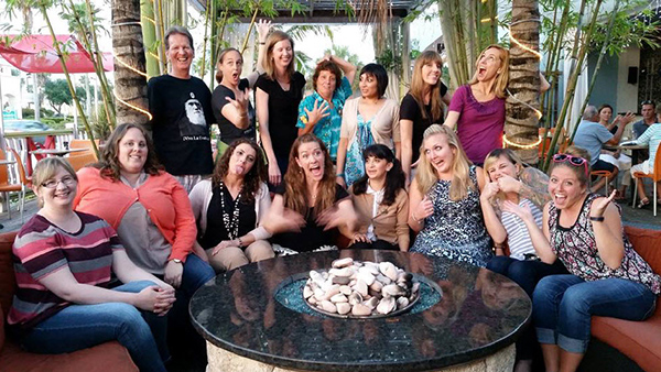 Stan in 2015 surrounded by students from 1997-2015. Photo by L. Highfil