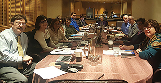 Board members get down to business.