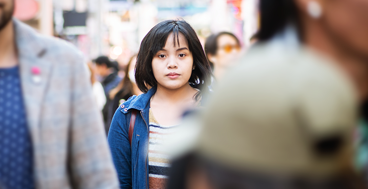 Woman's face in a crowd