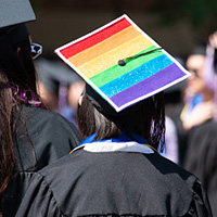 graduation cap decorated with rainbow colors