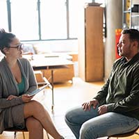 man and woman having a conversation