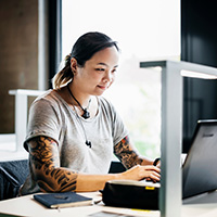 young woman using a laptop