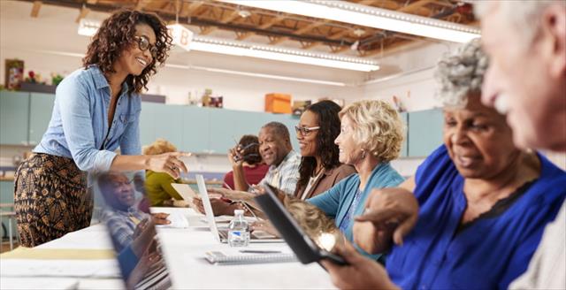 group of older persons in a classroom