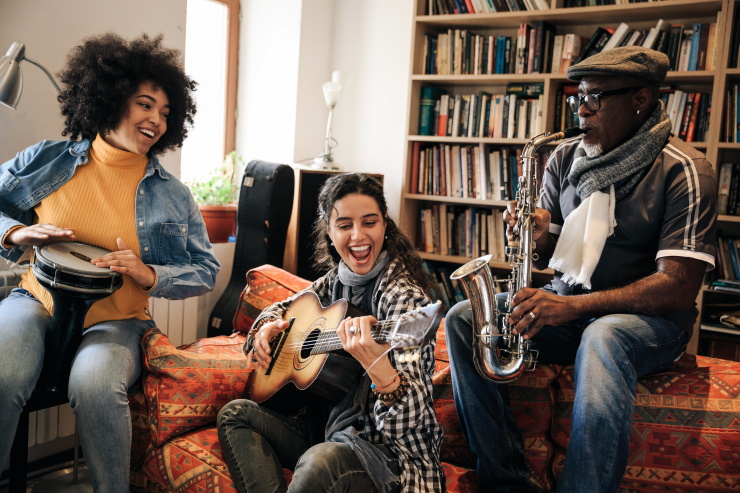 young diverse people playing instruments