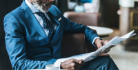 person reading a newspaper