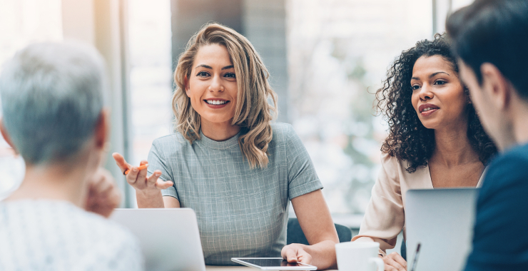 women at a business table