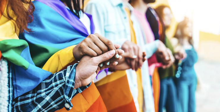 people holding hands depicting lgbtq alliance