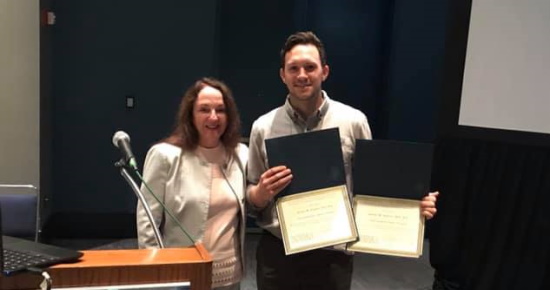 Justin Karter receiving the Div. 24 student awards