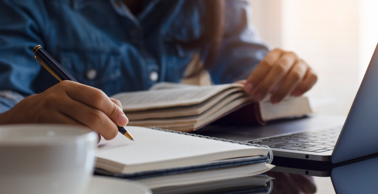 Writing in notebook
