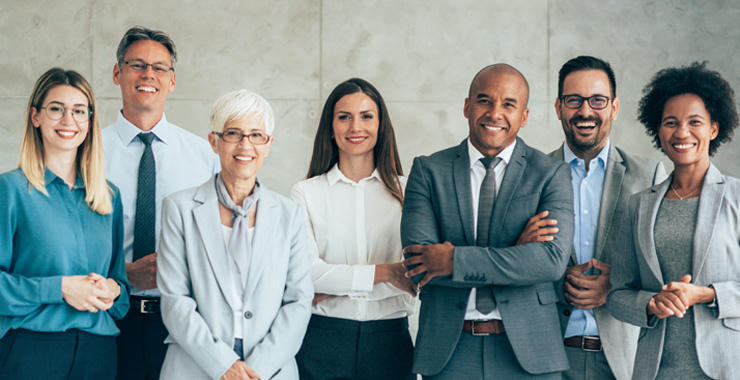 Group of professionals standing together, representing leadership, collaboration, and professional engagement.