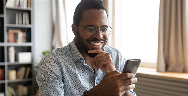 Man looking at his cell phone