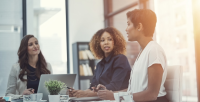 racially diverse young women talking